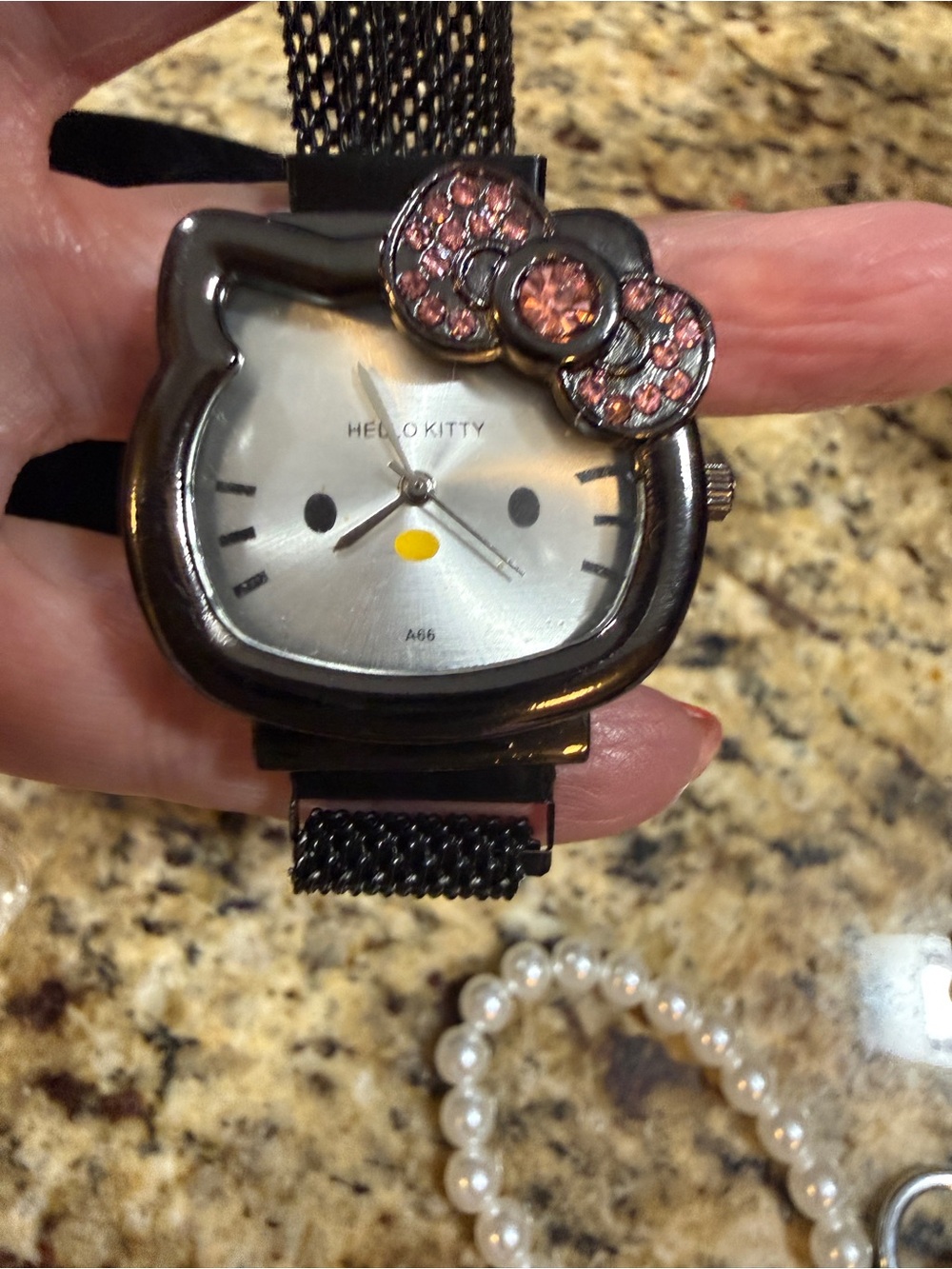 Hello Kitty Silver Face Watch with Pink Crystal Bow Accent